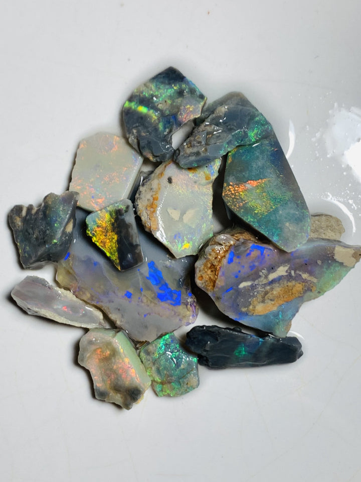 Lightning Ridge Opal Rub n rough Parcel Black & Semi Black  parcel from the Miners Bench® 64cts Stunning Bright Multifires to faces 27x22x3mm to 10x8x4mm WST85