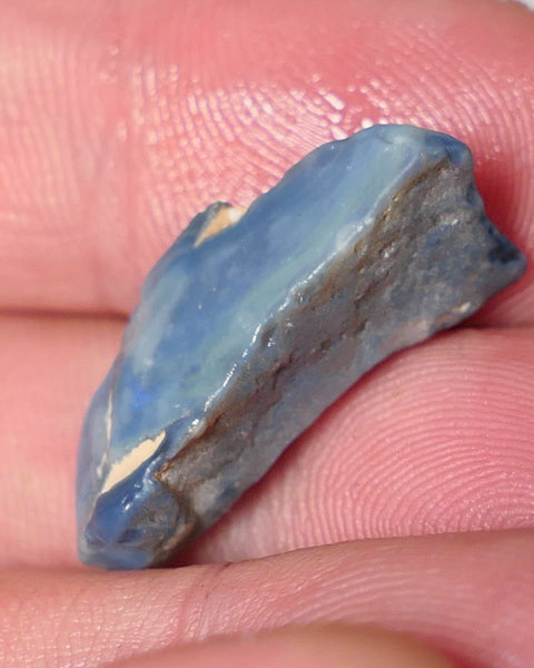 Lightning Ridge Rough Opal 10cts Dark Base Gamble Seam Blues in the bar 24x10x9mm 0621