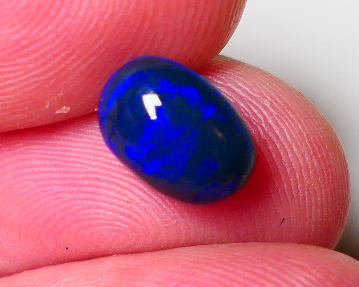 Lightning Ridge Black Crystal Opal Gemstone 2.40cts Gem Grade Mulga® N4 Black Body Tone High dome B6 Brightness Stunning Royal Blues 10x6x5mm UK07