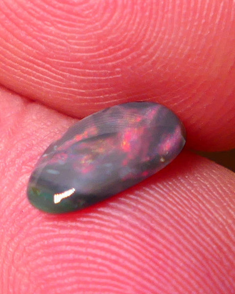 Lightning Ridge Red on Dark base Opal Gemstone 0.7cts Red dominant fires with Flat face 10x5x2mm 0652