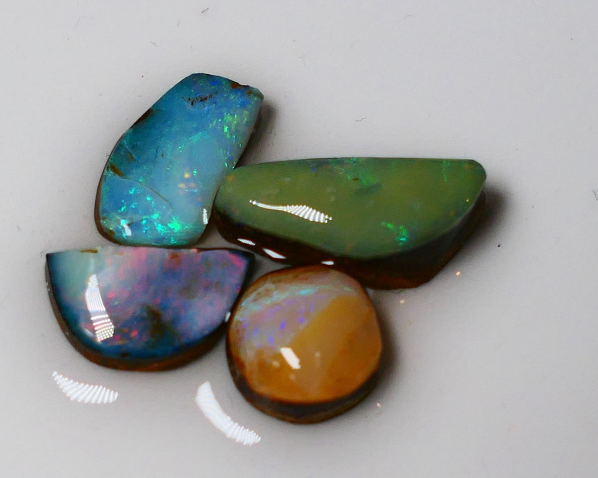 Queensland Boulder Boulder opal parcel 17cts rough / Rubs Winton some Multi fires to faces 15x7x5mm to 10x9x5mm 0719