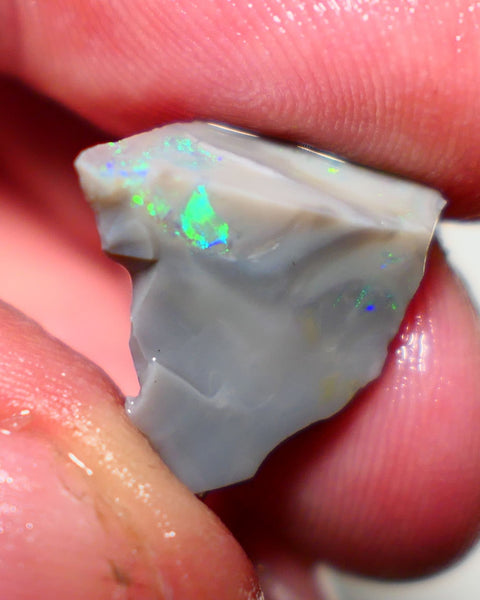 Lightning Ridge Rough Opal 8cts Dark Seam showing nice multicolours in warped colour bar 16x15x7mm 1322