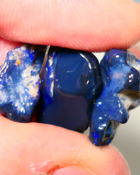 Lightning Ridge Rough Opal 26cts Blacks seams Trio showing some Blue fires 22x12x8mm to 16x9x7mm A1516