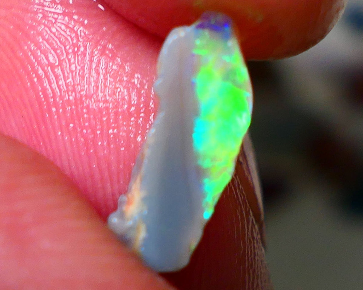 Small Candy to Cut Crystal on dark base 1.80cts Exotic bar with Vivid & Bright fires 14x5x4mm NS144