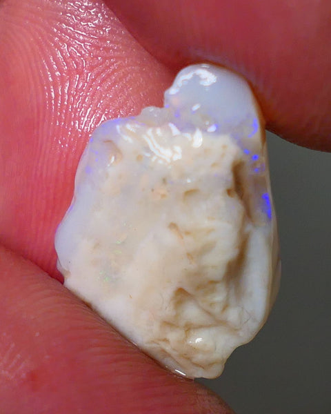 Lightning Ridge Rough Opal 8.00cts Light base Seam showing Nice blue colours 21x14x5mm NS179