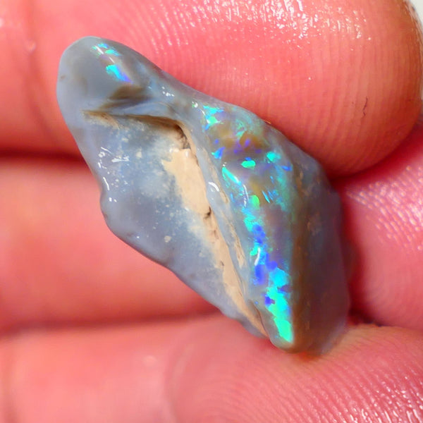 Exotic Electric Fires  on Dark Opal Miners Bench® Seam Rough Rub 9.00cts Slightly Directional Green/Teal/Blue/Yellow/Orange 24x10x8mm NS178