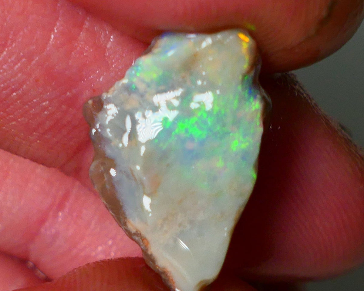 Lightning Ridge Rough Opal 5.00cts Dark Crystal Seam showing Green/Orange Dominant colours 20x11x4mm NS343