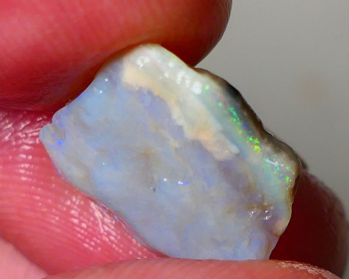 Lightning Ridge Dark Crystal Seam opal rough 7.25cts showing Gemmy bright bar with multi colours to cut worth a gamble on this one cut a gem 16x14x5mm ALP118