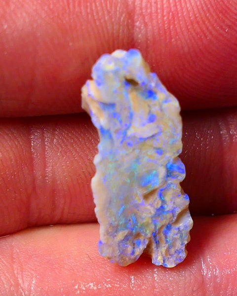 Lightning Ridge Gamble opal rough rub showing nice bright blue colours 26x10x7mm ALP128