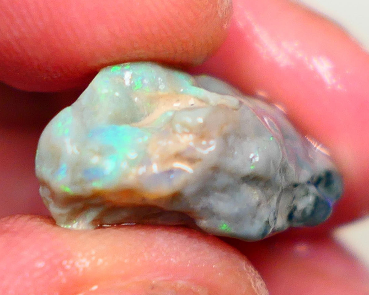 Green centered dominant multi fires on this untouched knobby 12.00cts to Cut and explore 21x13x10mm AUCTION52