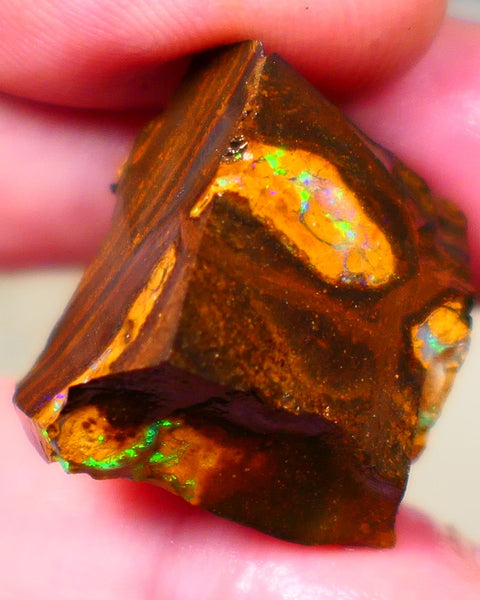 Winton Gem Boulder opal to cut 57.00cts Wonderful Bright & Vibrant Multifires showing on 4 sides time to take the cap off who wants it ? Auction91