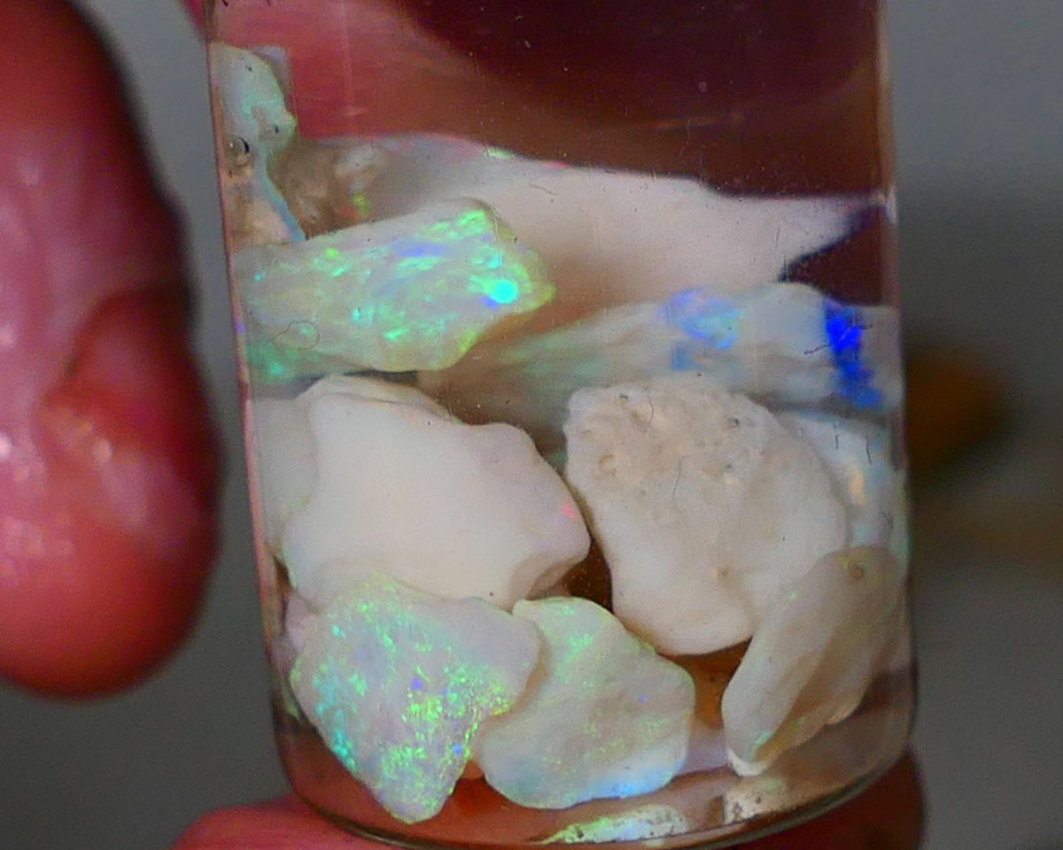 Lightning Ridge Rough Opal Small seams 21cts Light base Multicolours 11mm to chip size range Auction74