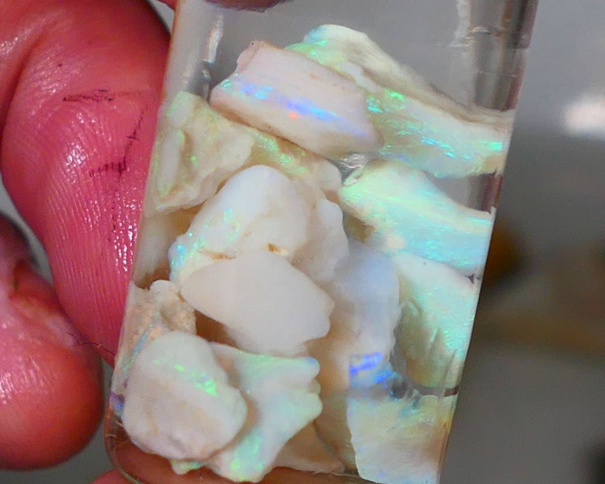 Lightning Ridge Rough Opal Small seams 21cts Light base Multicolours 11mm to chip size range Auction74