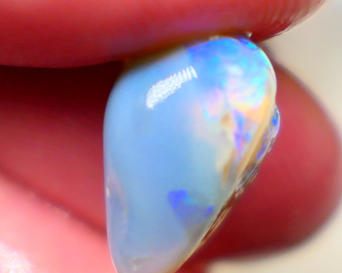 Lightning Ridge Rough knobby opal 7.80cts Dark base fresh from wash showing blue fires in scattered a scattered 15x10x9mm Auction131