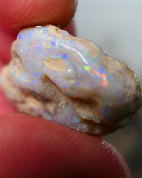 Lightning Ridge Knobby opal formation rough 25.00cts Displaying nice Pastel tones & colours of Multifires 21x20x9mm Auction154