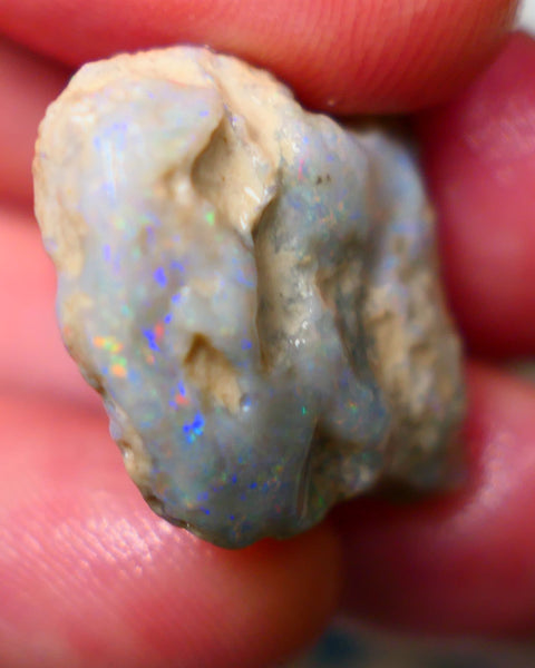 Lightning Ridge Knobby opal formation rough 25.00cts Displaying nice Pastel tones & colours of Multifires 21x20x9mm Auction154