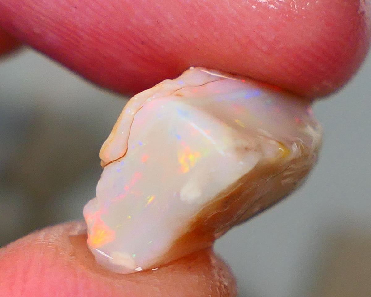 Mintabie Light Base Seam opal 5.75cts Multicolour fires showing  in the bar sold as gamble 13x10x8mm Auction195