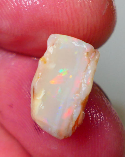 Mintabie Light Base Seam opal 5.75cts Multicolour fires showing  in the bar sold as gamble 13x10x8mm Auction195