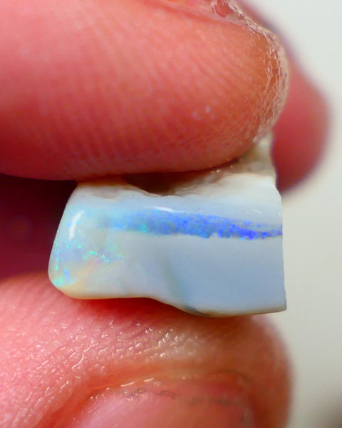 Lightning Ridge Seam opal Dark base 11.75cts Bright Blue bar with some Green fires 19x11x8mm Sold as gamble Auction173