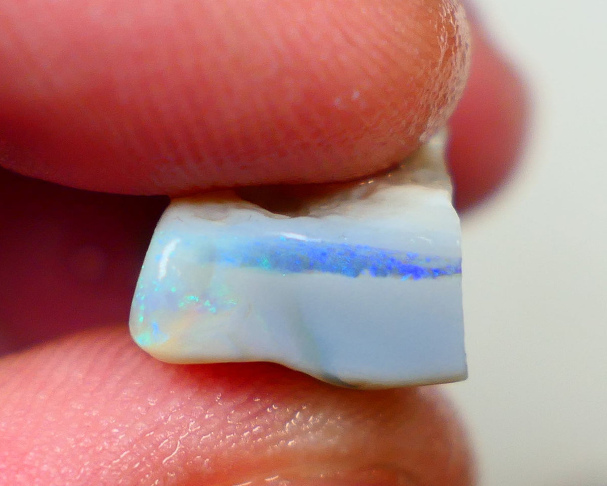 Lightning Ridge Seam opal Dark base 11.75cts Bright Blue bar with some Green fires 19x11x8mm Sold as gamble Auction173