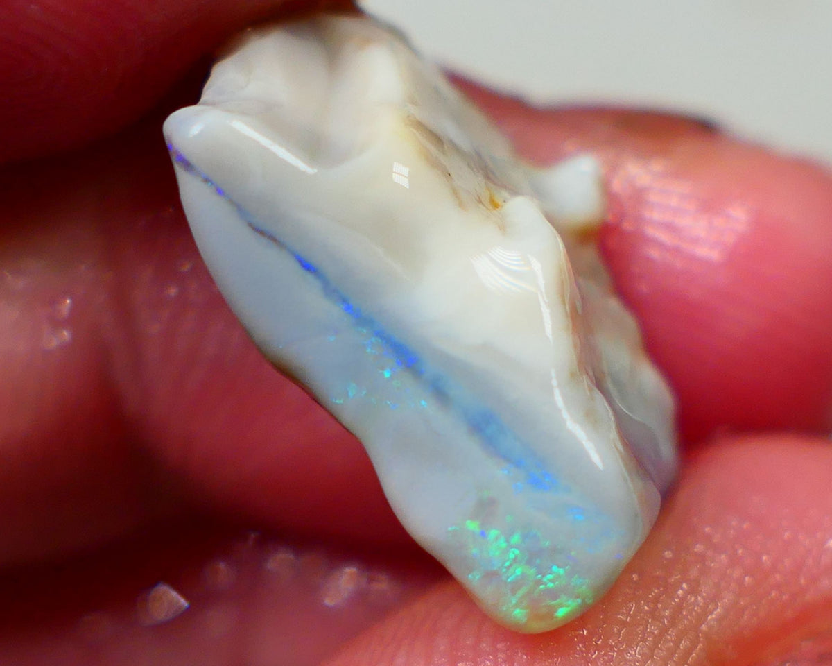 Lightning Ridge Seam opal Dark base 11.75cts Bright Blue bar with some Green fires 19x11x8mm Sold as gamble Auction173