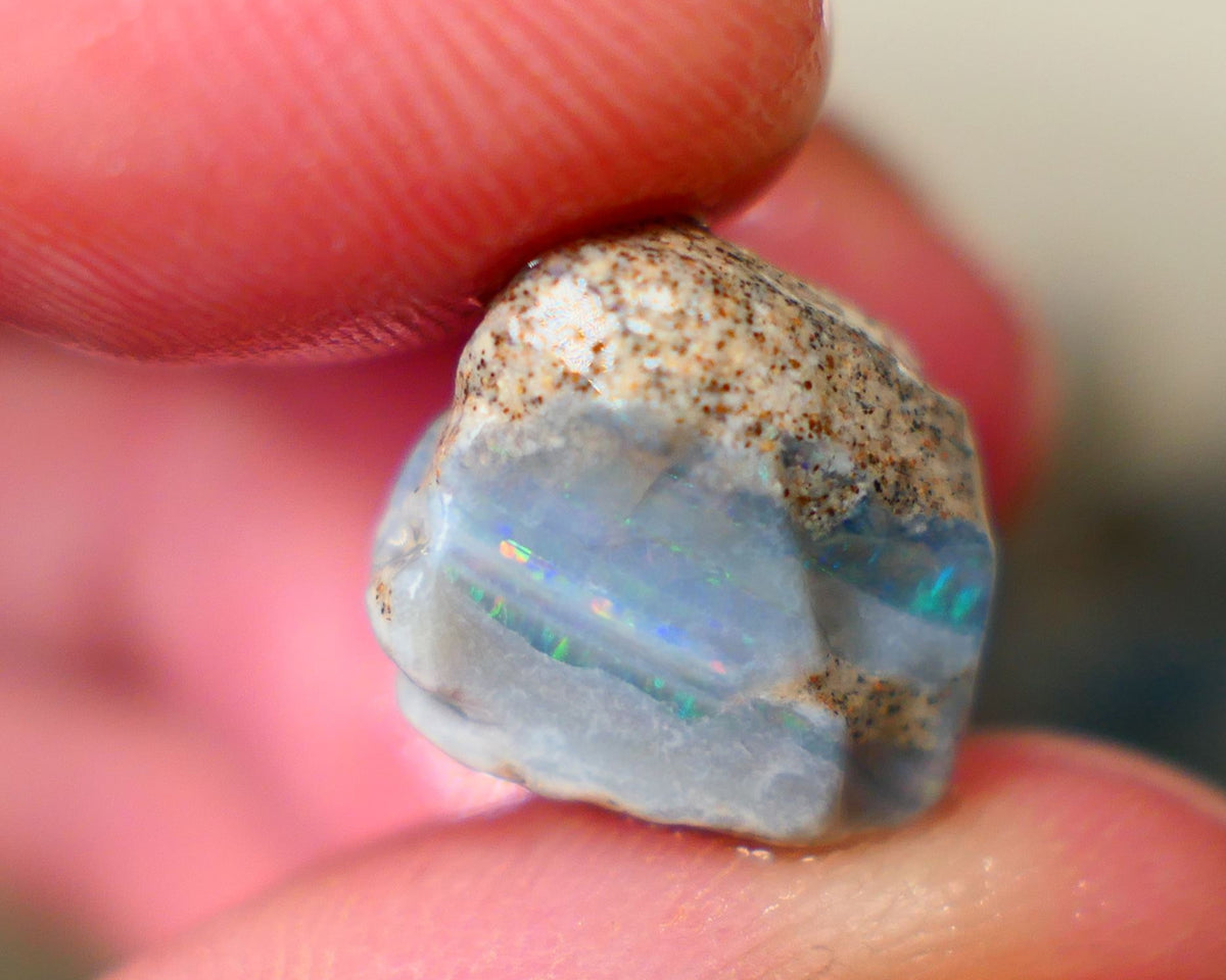 Mintabie Seam opal rough 13.50cts Multicolours showing in the exposed bar sold as gamble Auction211