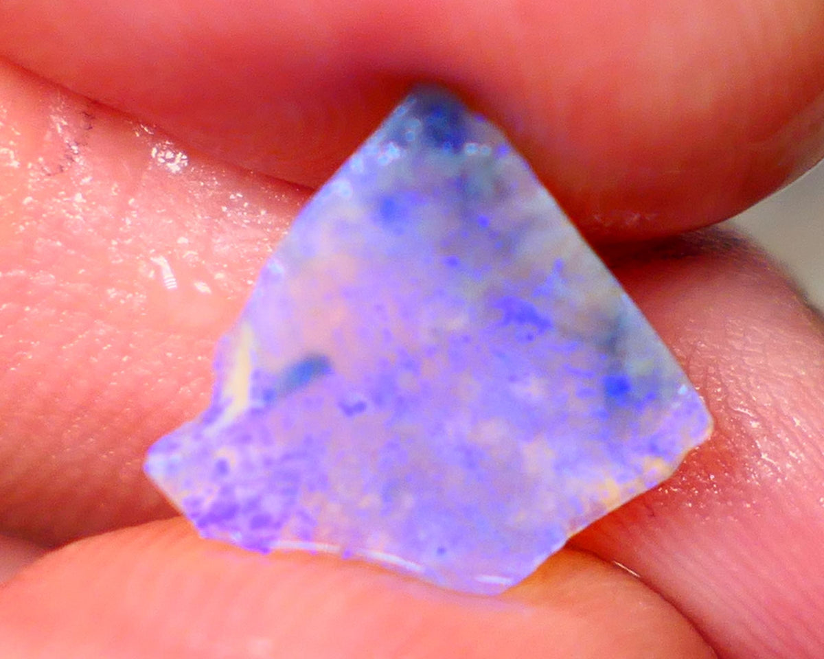 Lightning Ridge Dark base Crystal Seam opal 1.30cts Note this is thin So suit inlay/doublet etc Nice Bright Blue fires to work with 12x11x1.5mm GMB-025