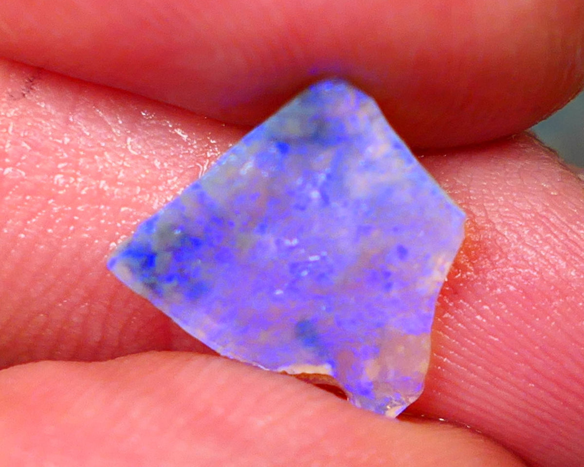 Lightning Ridge Dark base Crystal Seam opal 1.30cts Note this is thin So suit inlay/doublet etc Nice Bright Blue fires to work with 12x11x1.5mm GMB-025