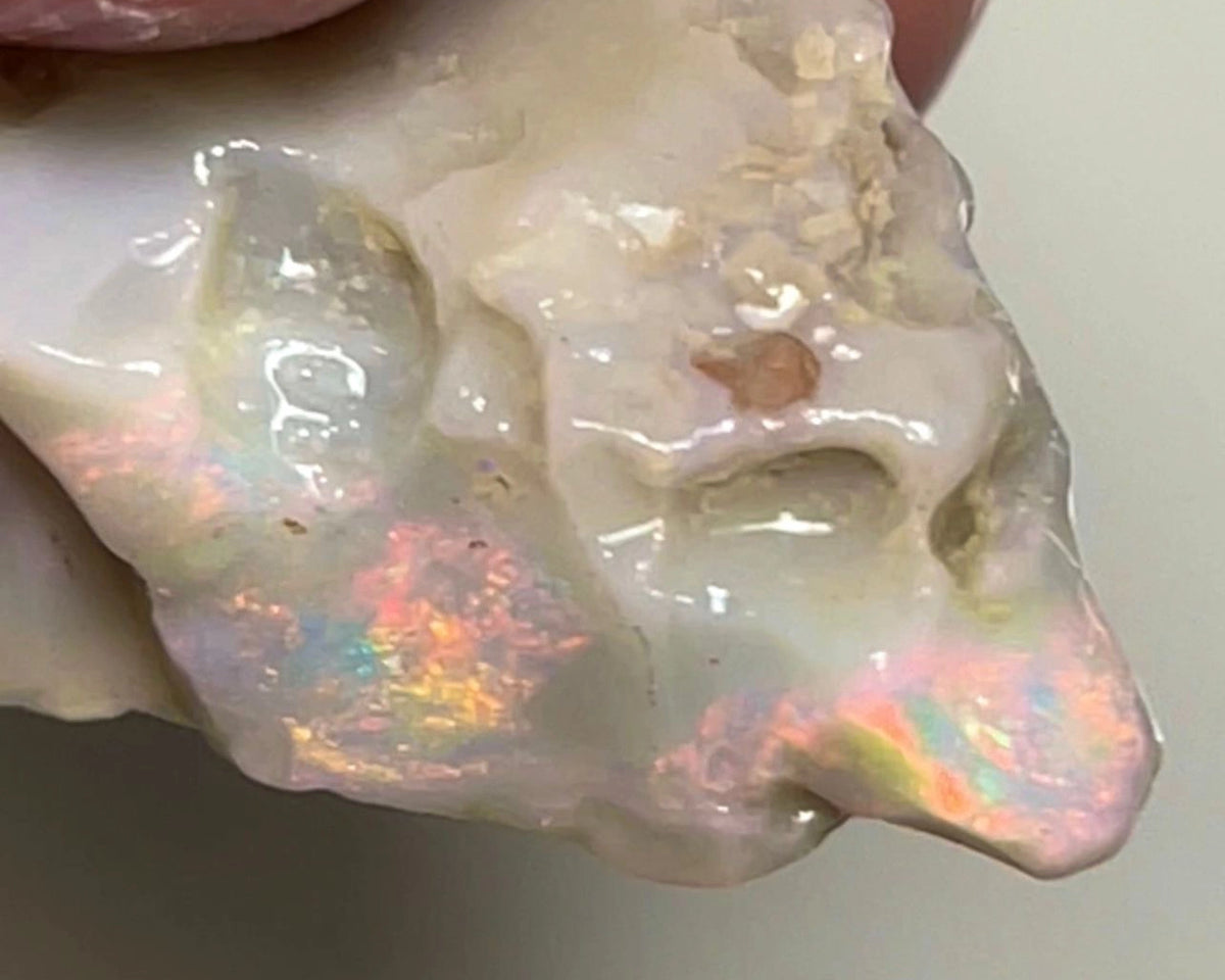 Lightning Ridge Rough Opal 16.75cts Untouched  Dark Seam Pink / orange dominant Multicolours to cut 26x15x9mm NSA004